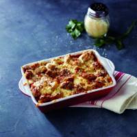 Meatball Bake · Marcos meatballs and sausages baked with sauce and three cheese blend.