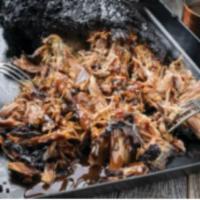 Billy Bob's Pulled Pork  · Mouth watering Texas Slow Smoked pulled pork. Sauce added upon request. Our Blue Ribbon
winn...