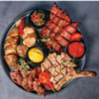 Billy Bob’s Two Meat Plate · Choose two mega-portions of two of our delicious Texas Slow Smoked meats and two delicious
h...
