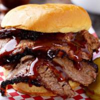 Billy Bob's 2 Meat Sandwich · Choose a mega-portion of two of our Texas Slow Smoked meats on a large 4 1/2 inch buttery br...