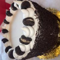 Oreo · Chocolate sponge with oreo filling and whipped cream frosting
