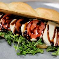 Caprese Time · Fresh mozzarella, with tomato, a drizzle of olive oil, and balsamic glaze all on a bed of ar...