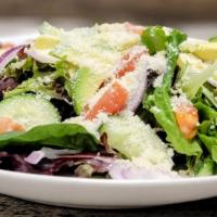 House Salad · Mixed greens, with cucumber, onion, tomato, Parmesan and choice of dressing.