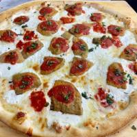 Eggplant Pizza · Classic crust with mozerella, fresh mozerella, eggplant, sauce, fresh basil and olive oil