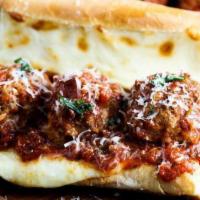 Meatball Parmigiana Hero · Home made beef meatball in our famous marinara sauce baked with mozerella cheese on top of a...