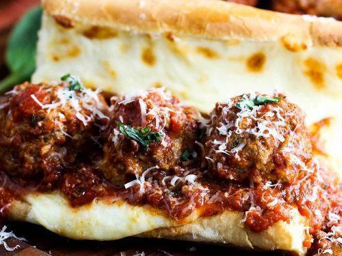 Meatball Parmigiana Hero · Home made beef meatball in our famous marinara sauce baked with mozerella cheese on top of a toasted italian hero