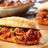 Italian Sausage Parmigiana Hero · Italian link Sausage in our famous marinara sauce baked with mozzarella cheese on top of a t...