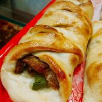 Sausage Roll · Italian link sausage with peppers, onions and mozzarella cheese rolled up and baked