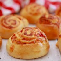 Pepperoni Roll · Sliced pepperoni and mozerella cheese rolled up and baked to perfection