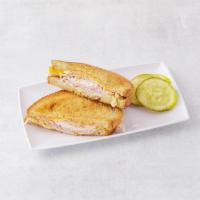 10. Monte Cristo Lunch · Grilled ham, turkey, melted Swiss and cheddar cheese with honey mustard dressing. Served on ...