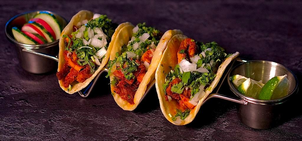 Mini Taco Trio (3) · Corn Tortillas with Choice of Meat,Onions,Cilantro and Our Home Made Green/Red Sauce