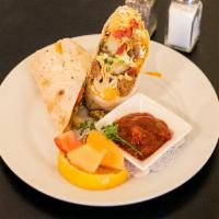 Breakfast Burrito · Chorizo sausage, 3 eggs, red and green peppers, green onions, potatoes, cheddar cheese, with...