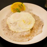 Biscuits and Gravy Breakfast · Home made fluffy biscuit smothered in country sausage gravy. With 2 eggs prepared your way.