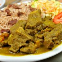 Ram-It-Up Curried Goat Meal · Goat meat cooked in curry, tumeric, assorted herbs and spices until it is tender.