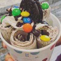 2. Cookie N' Time Rolled Ice Cream · Base: Vanilla ice cream with Oreos cookie. Topping: Real Oreos, whipping cream, chocolate fl...