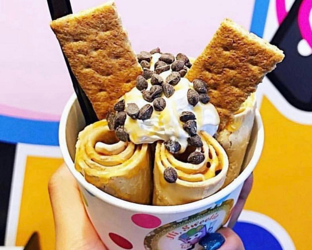 10. Mr. Coffee Rolled Ice Cream · Base: Coffee Flavor Ice Cream Base. Topping: Whipping Cream, Chocolate Chips, Graham Crackers and Caramel Sauce.