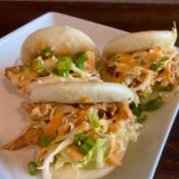 Shoyu Bao Special · Shoyu chicken bao buns with a sesame dressing slaw, pickled cucumbers, green onions, and spi...