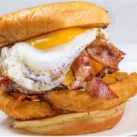 Big Daddy Burger · 6oz Cheeseburger with Bacon, Sunny Side Egg, Onion Rings on a Potato Bun with choice of fries