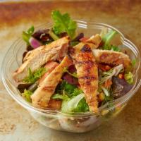 A2. Grilled Chicken Salad · Prepared with lettuce, tomato, peppers, onions and cucumber.