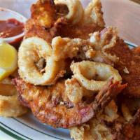 Fried Seafood Mix Plate · Calamari, shrimp and fish. Served with soup and salad, your choice of side, pita bread, mari...