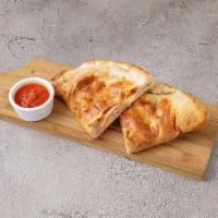 Meat Calzone · Sausage, pepperoni and meatballs.
