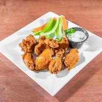  Traditional Buffalo Wings · Fried in a lightly spiced batter spun in your favorite buffalo wing sauce, blue cheese or ra...