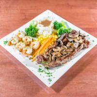 Rib Eye and Shrimp · Grilled shrimp, steak, broccoli, mashed potatoes and house made steak sauce.