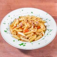 Penne alla Greca  · Fresh cherry tomato sauce with spinach and topped with feta cheese.