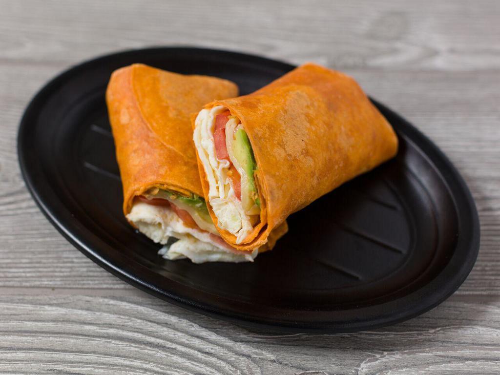4. Cali Breakfast Wrap Breakfast · 2 egg whites, avocado, tomatoes a pepper jack cheese on a wrap.