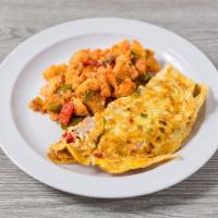 1. Western Omelette · Served with scrambled eggs, ham, bell peppers and onions. Served with home fries and toast.