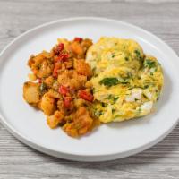 2. Greek Omelette · Served severed with scrambled eggs, olives, feta and cherry tomatoes. Served with home fries...