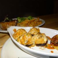 Crab Stuffed Mushrooms · Marinated mushrooms topped with provolone.