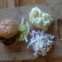Chopped BBQ Sandwich · Choice of one side, includes sauce and bag of pickles & onions