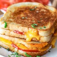 Full House Breakfast Sandwich  · Grilled with Boar's Head® American Cheese, Bacon Tomato and Egg