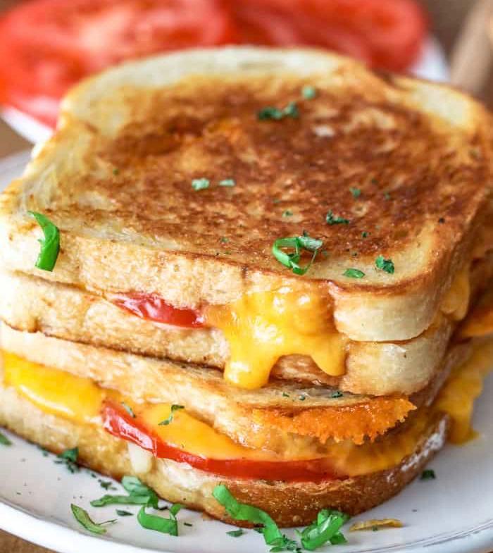 Full House Breakfast Sandwich  · Grilled with Boar's Head® American Cheese, Bacon Tomato and Egg