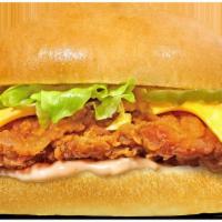 Fish burger deluxe  · Breaded fish comes with lettuce tomatoes on a burger bun.