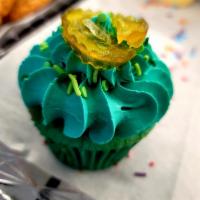 Pickle Cupcake · Lightly flavored pickle cupcake with a sweet pickle flavored buttercream and topped with a p...