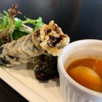 Gimmari · (2) glass noodles and assorted vegetables in a seaweed spring roll fried in tempura, with a ...