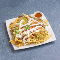 Carne Asada Fries · French fries topped with choice of meat, guacamole, cheese, pico de gallo and sour cream.