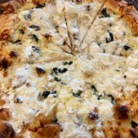 White Pizza · Touch of garlic, basil, cheddar, provolone and mozzarella cheese. Topped with Romano.
