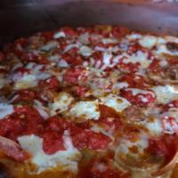Grandma Pizza · Chunky style pizza sauce infused with garlic and basil, fresh mozzarella topped with Sicilia...