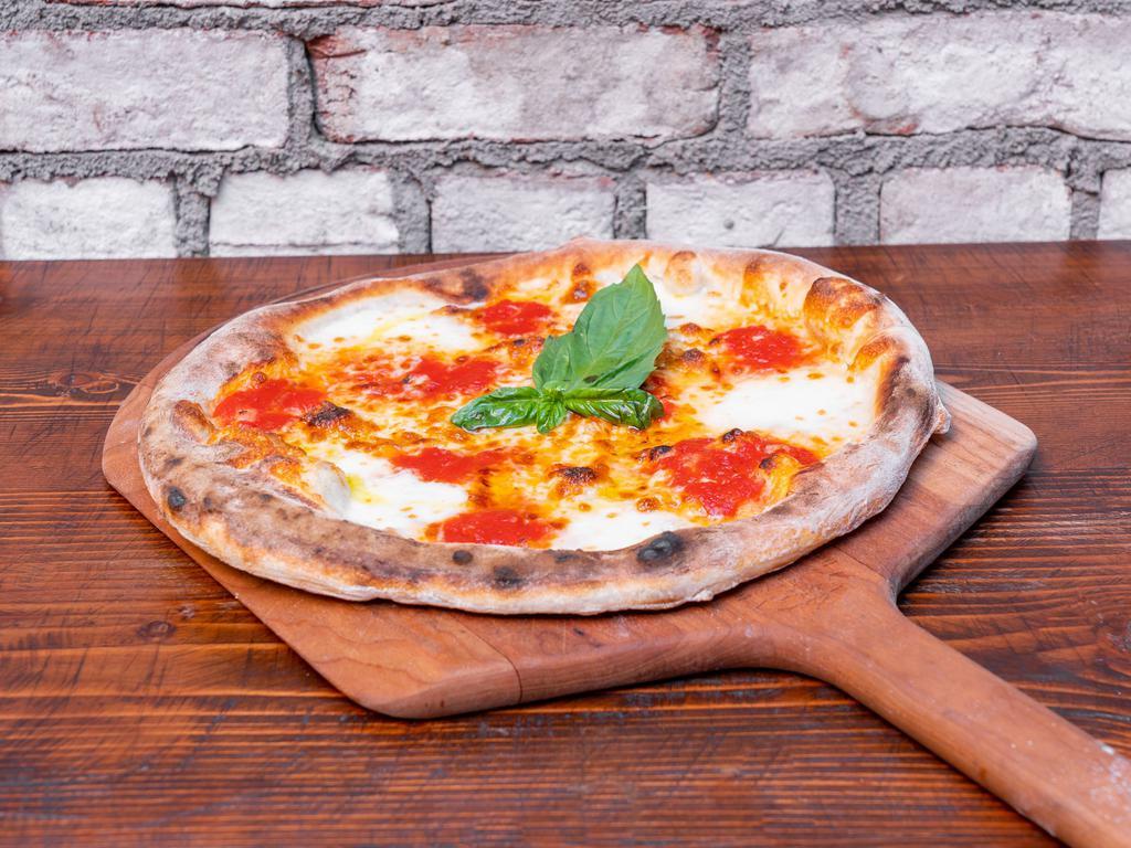 Margherita Pizza · Tomato sauce, mozzarella, basil, extra virgin olive oil.