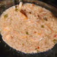 Seafood Gumbo · New year's seafood gumbo includes blue crab meat, scallops, shrimp, and more. Cooked seasone...