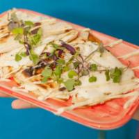 Carne Asada Quesadilla · 48 hour marinated flank steak served with 8 in flour tortilla along with Oaxaca cheese, and ...