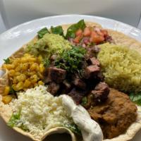 Carne Asada Bowl · Salad bowl served with Beef on grill, tomato, lettuce, Oaxacan cheese, avocado, and garlic m...