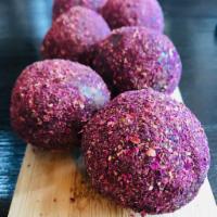 Rose Flower Bomb · Vegan truffles. With walnuts, cranberries and rose water. Covered in rose petals.