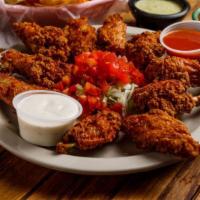 Chicken Wings (10) · Hot or mild. served with ranch dressing.
