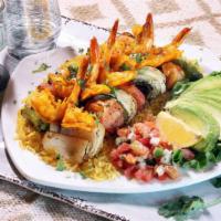 Alambre Skewers · 6 Jumbo shrimp, beef, or chicken, paired with fresh vegetables
(onions, tomatoes, bell pepp...