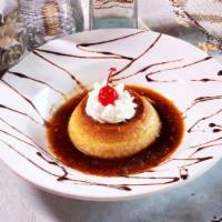 Flan · Homemade light Mexican egg custard with homemade Mexican
caramel sauce and whipped cream.
