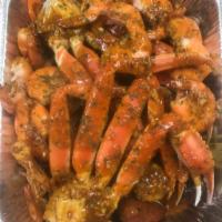 Combo #1 (feeds 1-2) · 2 clst snow crab - 1 lb. clams,  1 lb. shrimp, 4 slices sausage, 2 pieces corn, and 2 pieces...